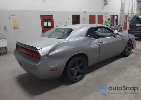 2013 Dodge Challenger Sxt z USA, uszkodzony, nr VIN 2C3CDYAGXDH619903